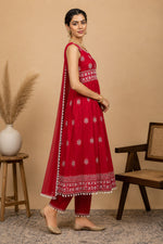 SN120 women’s red sleeveless kurta set side pose showing flare and dupatta drape