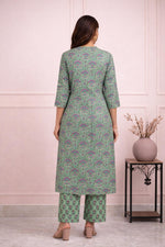 SN138 Aarini leaf green floral cotton kurta pant set for women back pose showing straight kurta fall