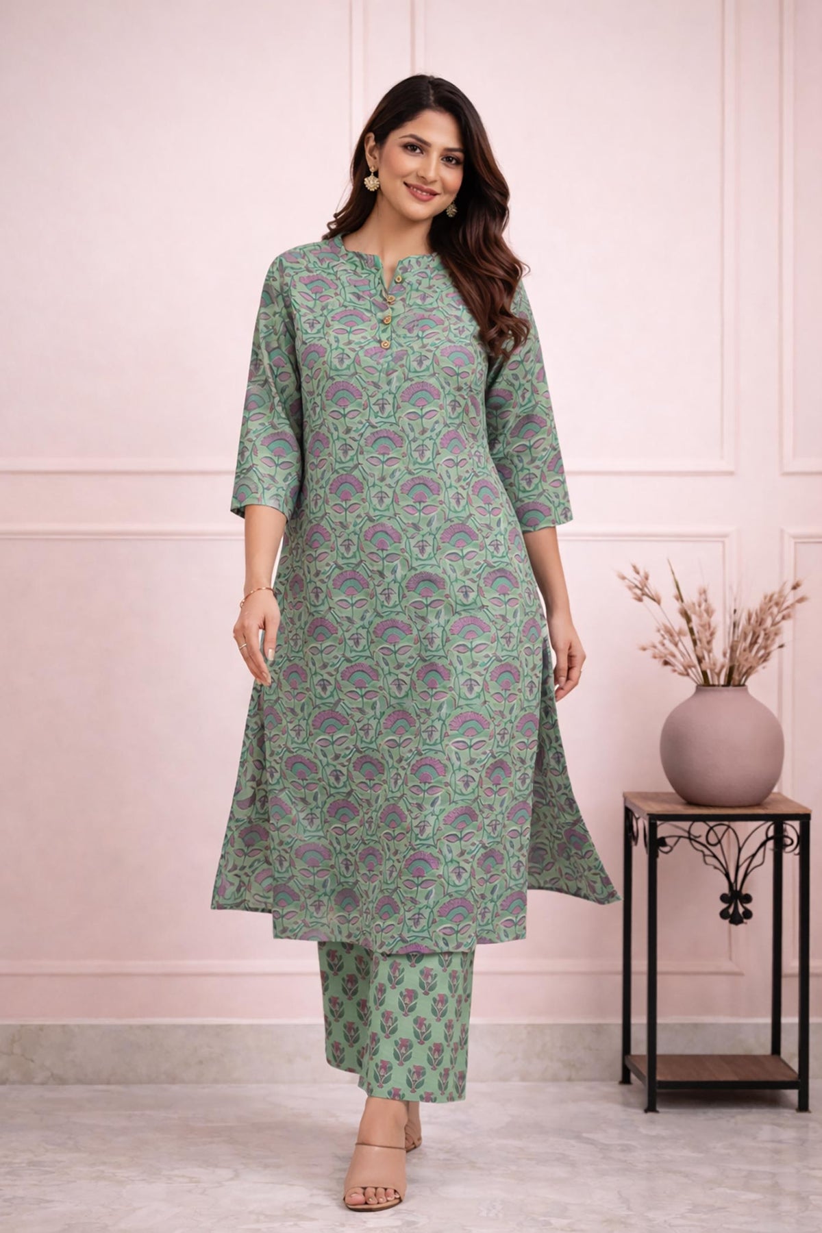 SN138 Aarini leaf green floral cotton kurta pant set walking pose for women in breathable cotton fabric