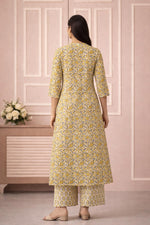 SN139 women’s mustard floral cotton kurta pant set with all-over vine print, back pose.