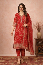 SN150 women’s vermilion red Bandhani cotton silk V-neck three-quarter sleeve kurta set front view with dupatta and heels.