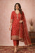 Vermilion red kurta set in walking pose with flowing dupatta and nude block heels.