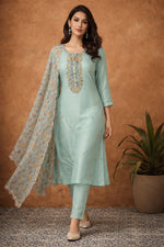 SN151 pastel aqua embroidered kurta set walking pose showing natural fabric movement and flow