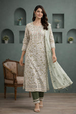 SN153 women’s ivory floral muslin kurta set walking pose with straight fit and coordinated pants