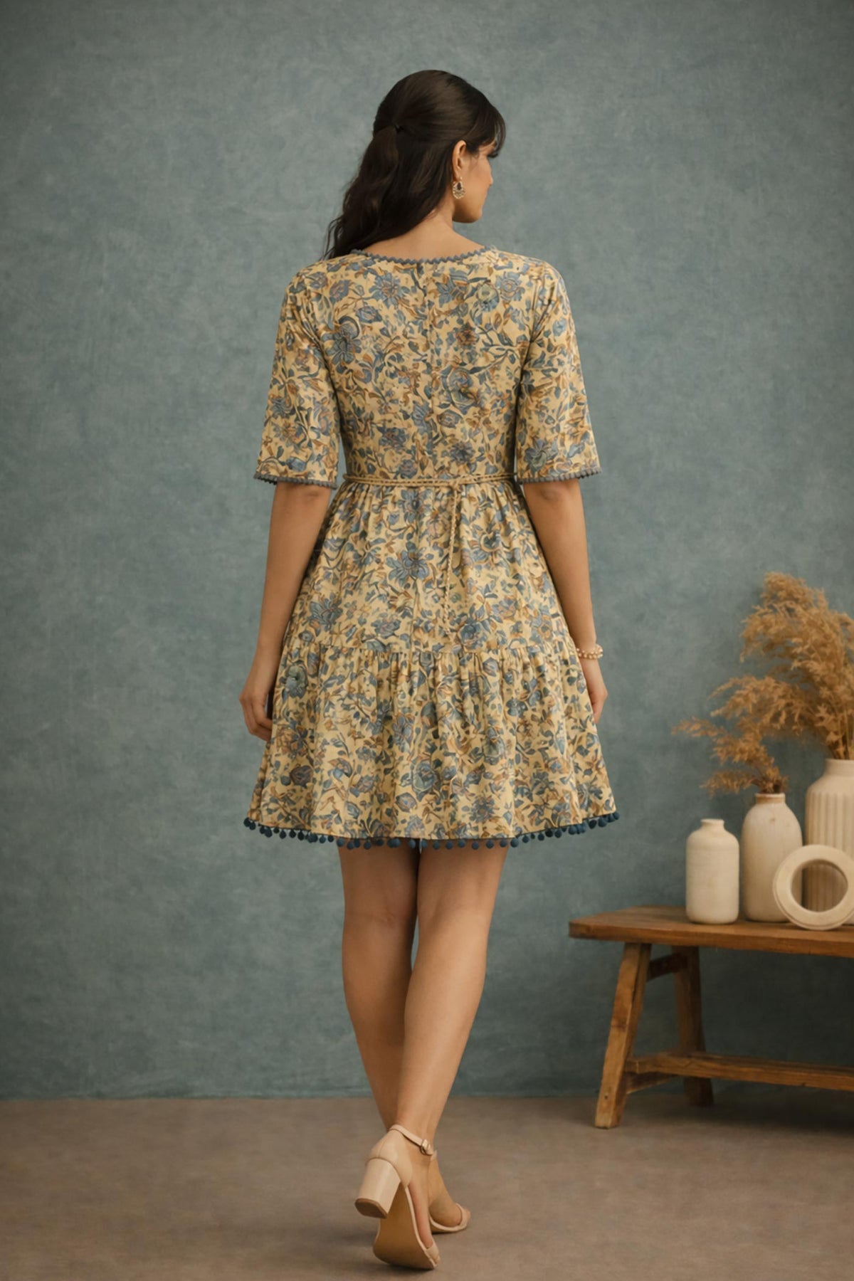 SN159 women’s butter yellow floral cotton tiered dress back view with tiered hem and tie detail