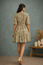 SN159 women’s butter yellow floral cotton tiered dress back view with tiered hem and tie detail