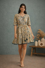 SN159 women’s butter yellow floral cotton tiered dress walking pose with flowy silhouette