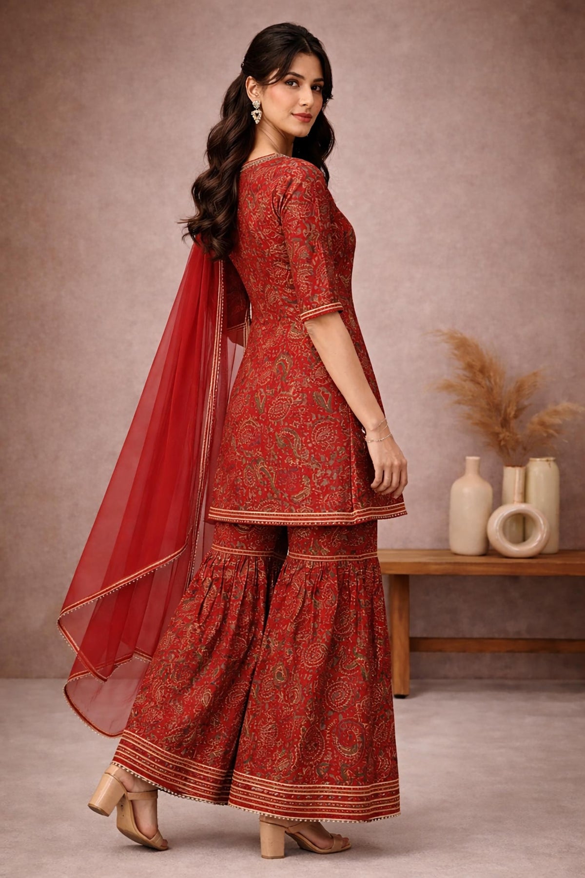 SN162 women’s red cotton silk kurta sharara set with V-neck and flared pants side view.