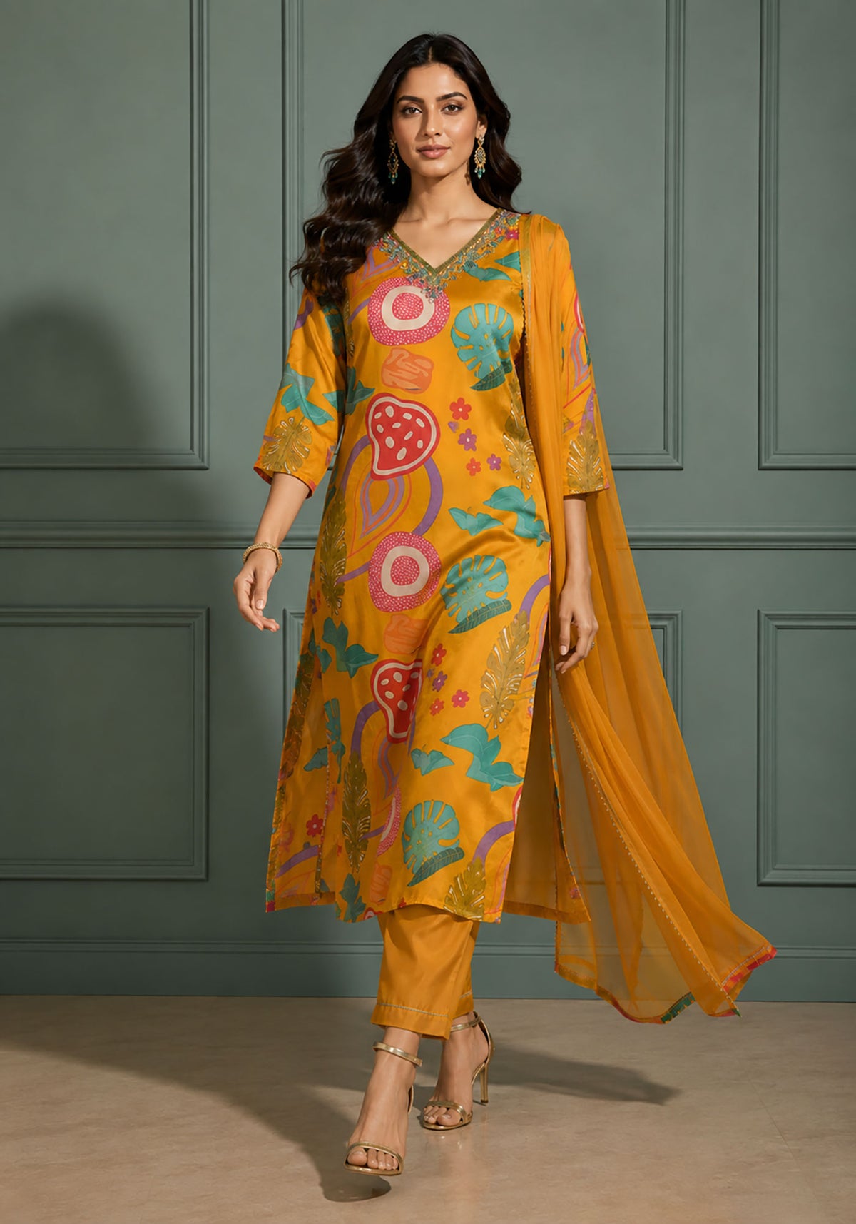 SN168 women’s mustard abstract print V-neck kurta set walking pose with flowing dupatta