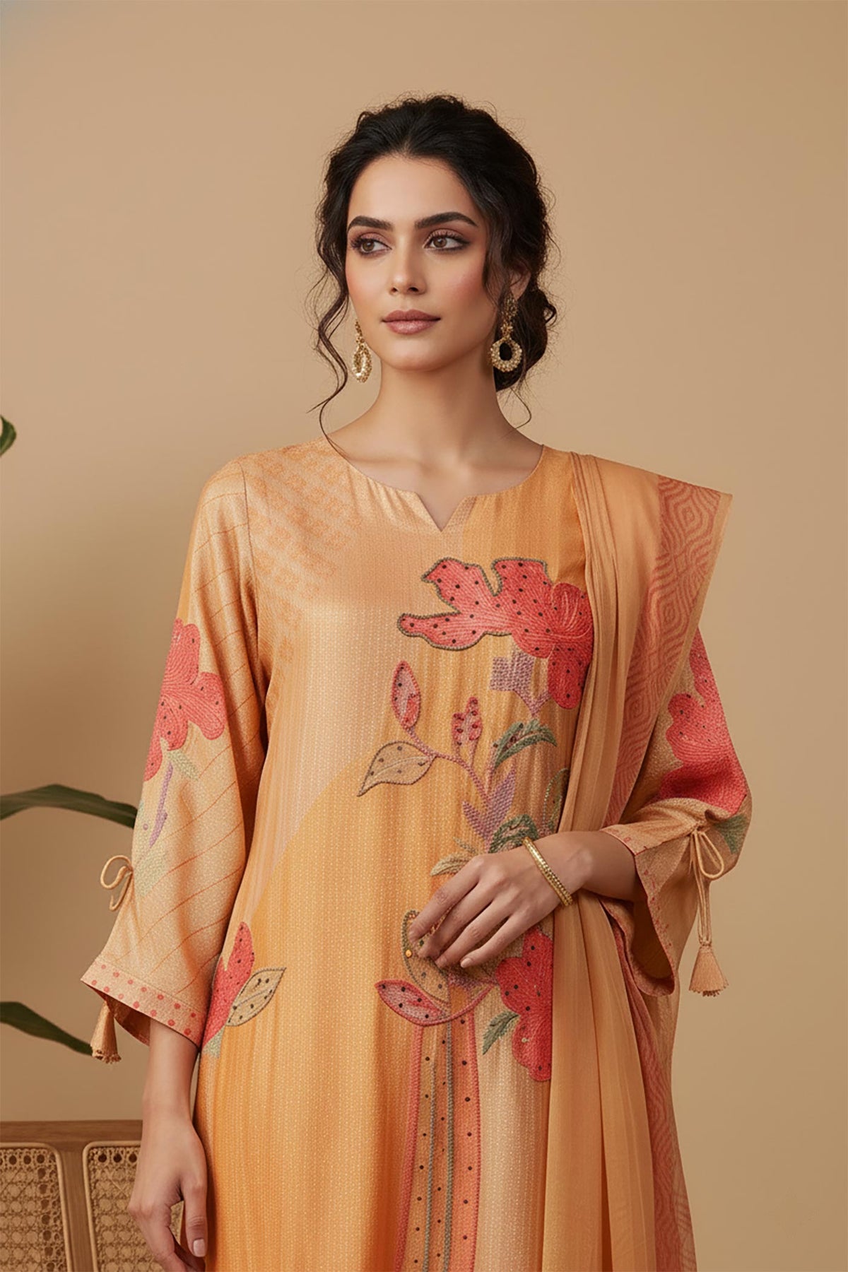SN169 women’s peach floral embroidered silk kurta set close-up showing V-neck and detailed embroidery
