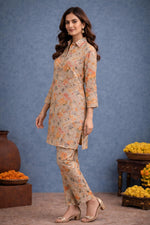 SN174 women’s warm beige floral satin co-ord set side pose highlighting straight kurta cut and slim ankle pants
