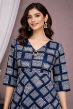 SN176 women’s navy blue cotton asymmetric dress closeup showing V-neck, geometric print, and three-quarter sleeves.