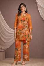 SN182 women’s burnt saffron floral silk blend co-ord set with V-neck kurta and straight pants front view