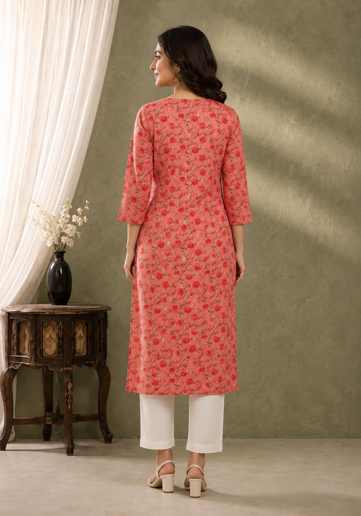SN185 women’s coral floral cotton kurti back pose with three-quarter sleeves and straight cut