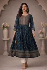 SN188 women’s teal cotton Anarkali kurti walking pose with flowing flare, round neck and three-quarter sleeves