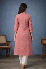 SN197 women’s coral pink floral cotton kurti with straight fit and three-quarter sleeves, back view.