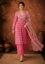 SN206 women’s blush pink printed A-line kurta set walking pose with flowing dupatta