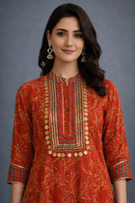 SN214 women’s vermilion red cotton kurta with mandarin collar and embellished yoke closeup view