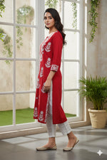 SN239 women’s crimson red cotton kurti with three-quarter sleeves and straight fit shown in side view