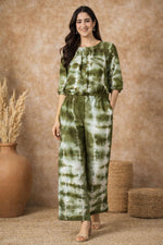 SN24 olive green tie-dye co-ord set for women, flowy fabric and natural movement walking pose
