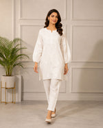 SN240 women’s ivory cotton chikankari kurta set with long sleeves and embroidered pants walking pose