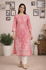 SN243 women’s dusty rose cotton straight kurta walking pose with V-neck, chikankari embroidery and relaxed fit