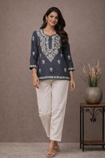SN251 women’s slate grey cotton kurti with floral embroidery and round neck walking pose