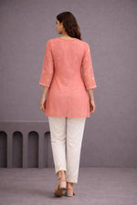 SN256 women’s coral orange organza short kurti back pose with semi A-line silhouette and sheer sleeves