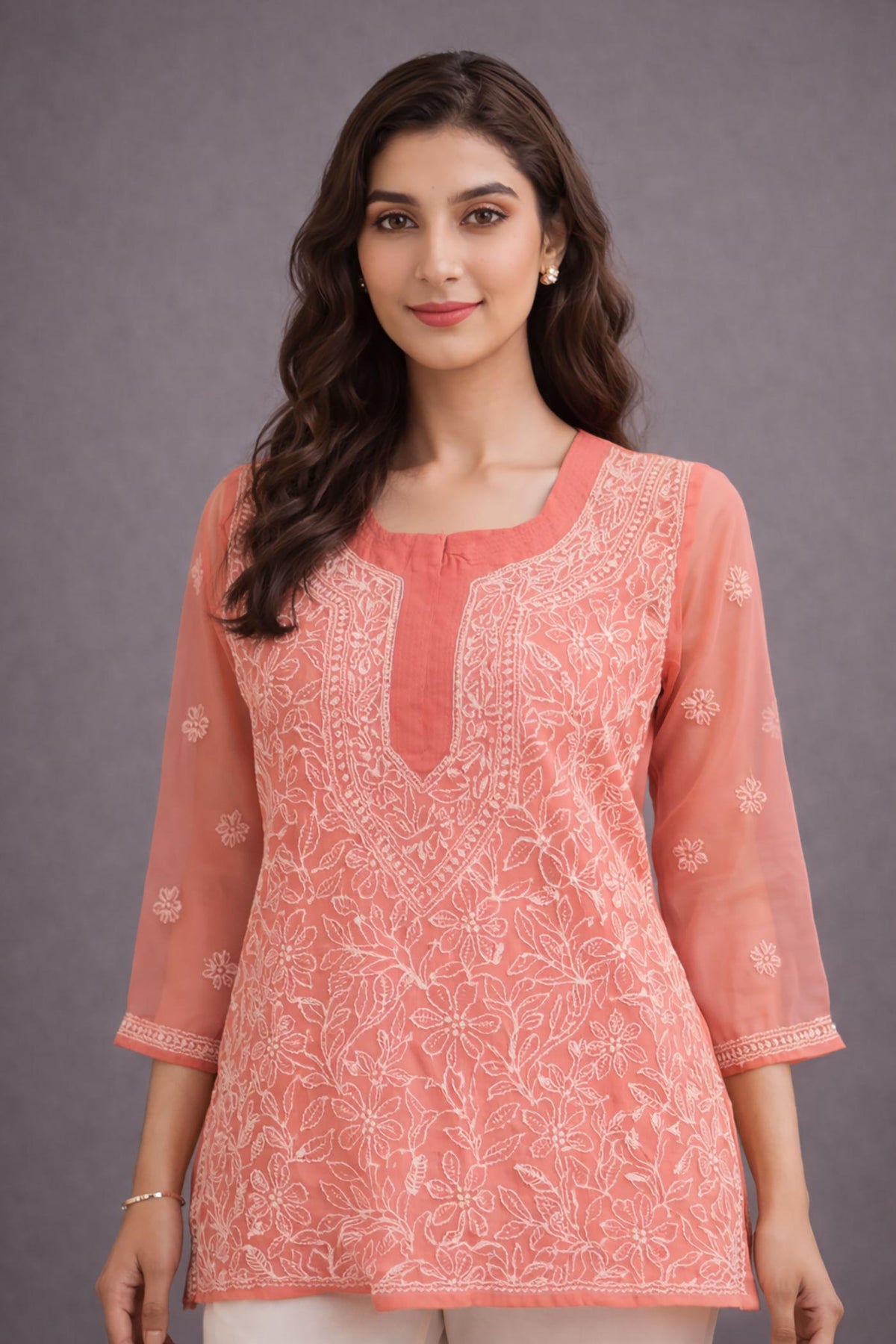 SN256 women’s coral orange organza short kurti closeup showing chikankari embroidery and rounded neckline