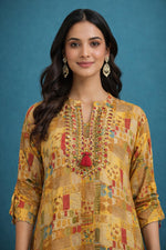 SN271 women’s mustard cotton kurta set closeup of embroidered V-neck with mirror work and tassel detail