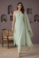 SN272 women’s mint green cotton blend striped kurta pant set with dupatta walking pose