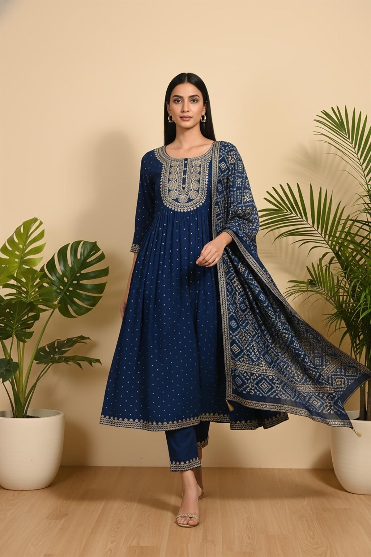 SN289 women’s navy blue embroidered kurta set with three-quarter sleeves walking pose