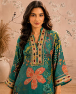 SN294 women’s teal printed poly georgette kurta set with embellished V-neck closeup pose