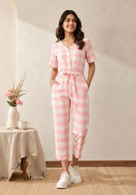 SN31 women’s pink gingham V-neck short sleeve jumpsuit with waist tie – front pose