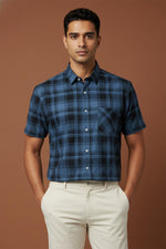 SN310 men’s midnight blue plaid short sleeve shirt closeup showing collar, buttons, and chest pocket