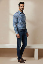 SN323 blue cotton blend slim fit long sleeve men’s shirt side pose styled with dark denim jeans