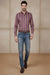 Men’s plum cotton blend geometric print shirt styled with blue jeans and brown formal shoes – walking view