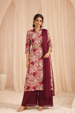 Maroon floral kurta set with palazzo and dupatta, front walking view with gold sandals.