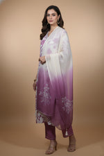 Side view of ivory mauve kurta set featuring flowing ombre dupatta and straight-fit pants with heels.
