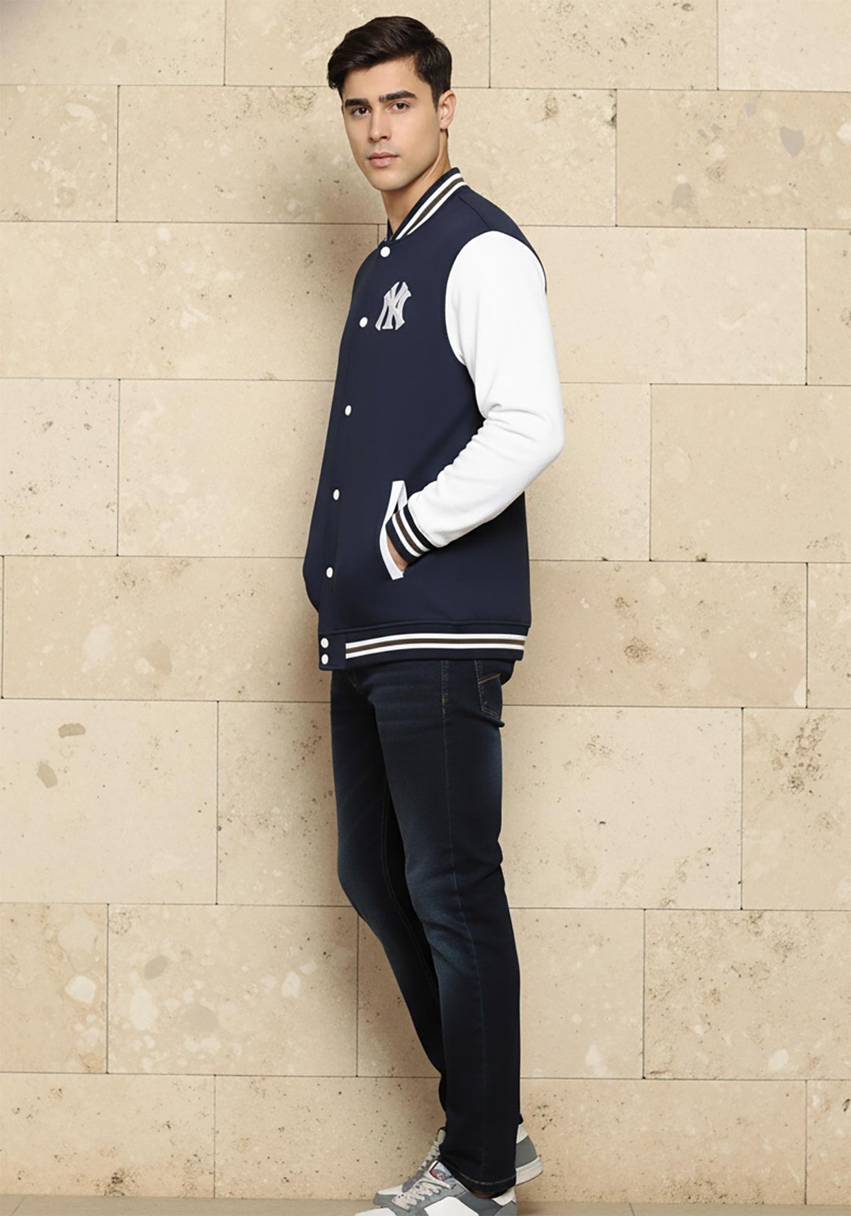 SN365 men’s navy and white varsity jacket side view with long sleeves, ribbed cuffs and structured fit