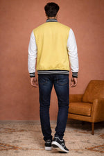 SN367 men’s pastel yellow varsity jacket back pose with ribbed hem and long contrast sleeves.