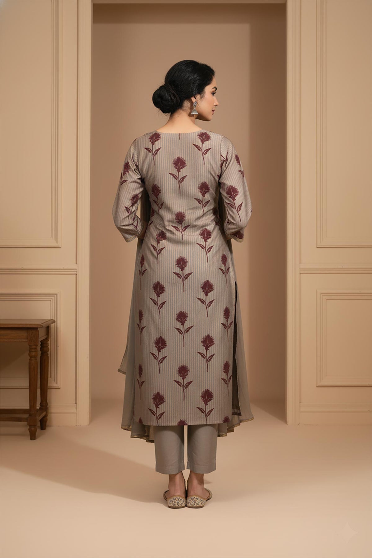 Grey silk-blend kurta set back view with vertical stripes, floral print, straight silhouette, ankle pants.