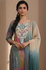 Teal multicolor kurta set featuring intricate white embroidery on round neckline, close-up front detail.