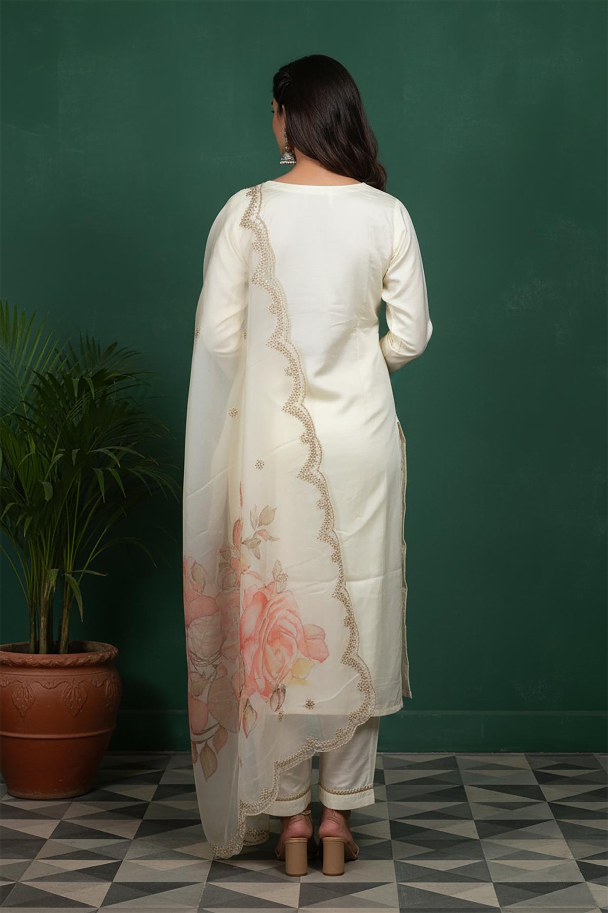 Ivory kurta set back view featuring scalloped dupatta border and floral print, straight silhouette with block heels.