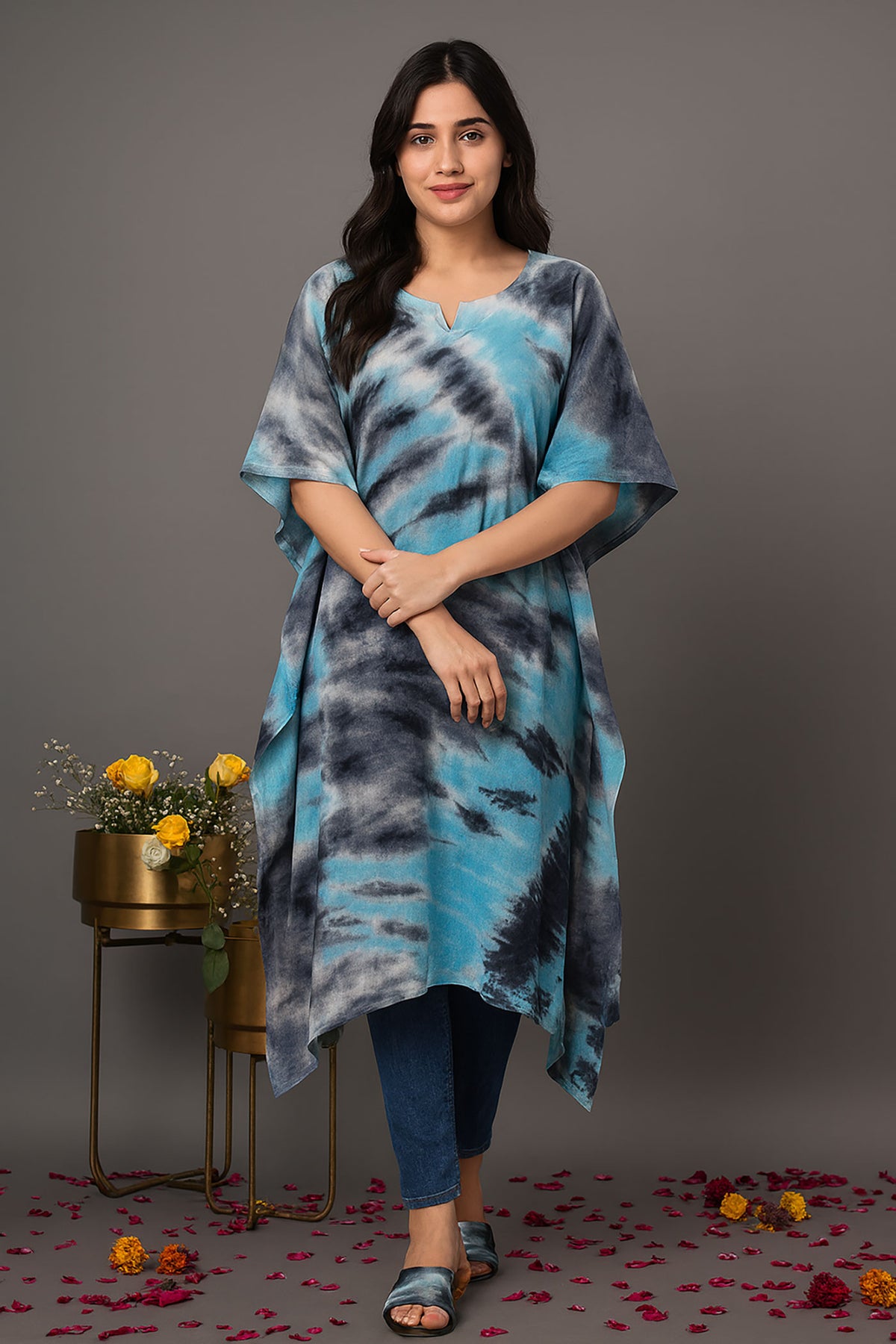 Women’s blue and black tie-dye kaftan kurti with relaxed fit, short sleeves and round neckline, front view styled with jeans for casual wear