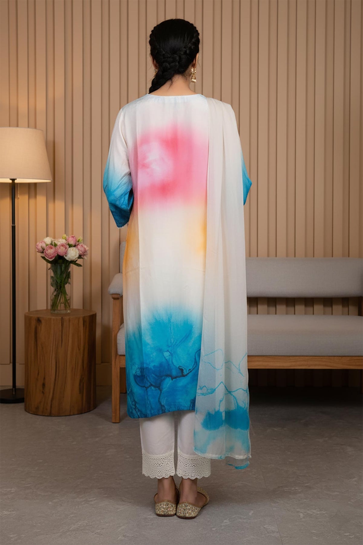 Multicolor ombre kurta set with watercolor print, sheer dupatta drape, straight silhouette, gold flats, back view.