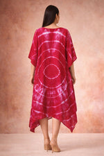 Back view of crimson tie-dye kaftan dress with asymmetric hem and relaxed flowy silhouette.