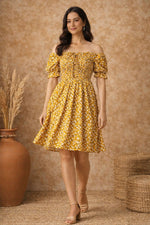Mustard floral off shoulder dress for women in walking pose showing flowy fit and flare silhouette