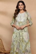 Woman wearing a floral dress against a beige background