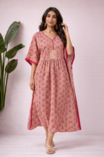 Pink and mustard cotton kaftan kurti with handblock print, V-neckline, elbow sleeves and empire waist detail front view